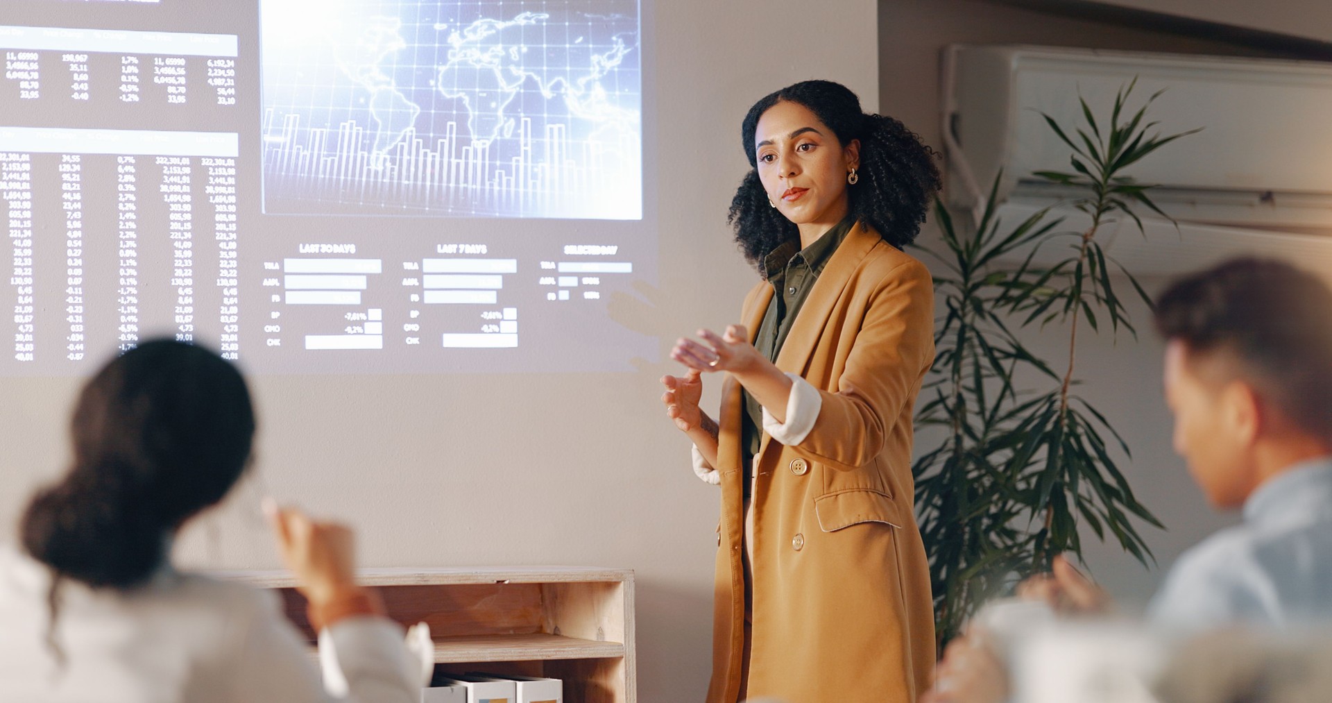 Projector, presentation report and business woman answer employee engagement on globalization stats, chart or graph. Audience question, worldwide data or leader mentoring agent on world economy forum